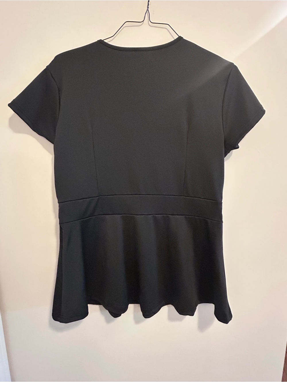 Flattering Black Cutout‎ Peplum Top - Picture 2 of 4